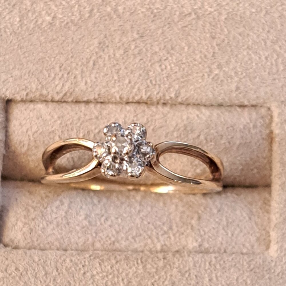 Diamond and 10kt yellow gold ladies cluster ring.